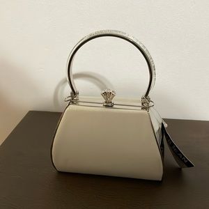Silver Evening bag with strap to convert to shoulder bag NWT.
